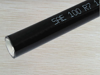 A section of SAE 100 R7 hydraulic hose.